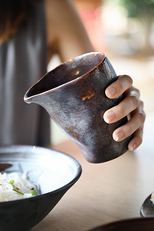 Stoneware pouring jar with a dark textured glaze, designed for home kitchens. Holds 400ml of gravy, sauces, and broths, and pours cleanly
