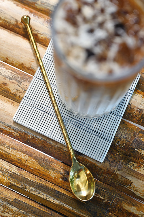 Ayutthaya hand-forged Thai cocktail spoon in Polished Steel, top view