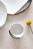 Gold leaf ceramic dipping dish styled on a dining table