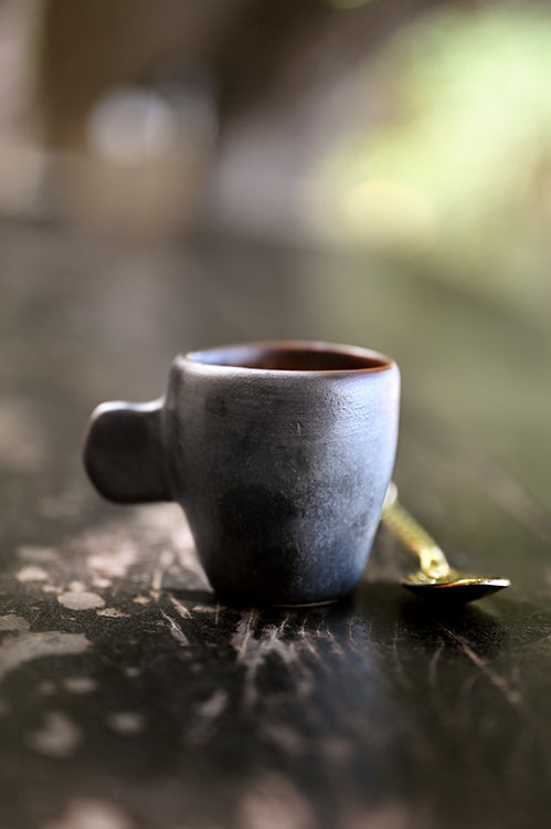 Wok Hei espresso cup styled with espresso on a morning counter
