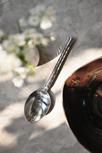Hand-forged polished silver stainless steel serving spoon, 23 cm, twisted hammered handle with teardrop end, for curries and sharing dishes